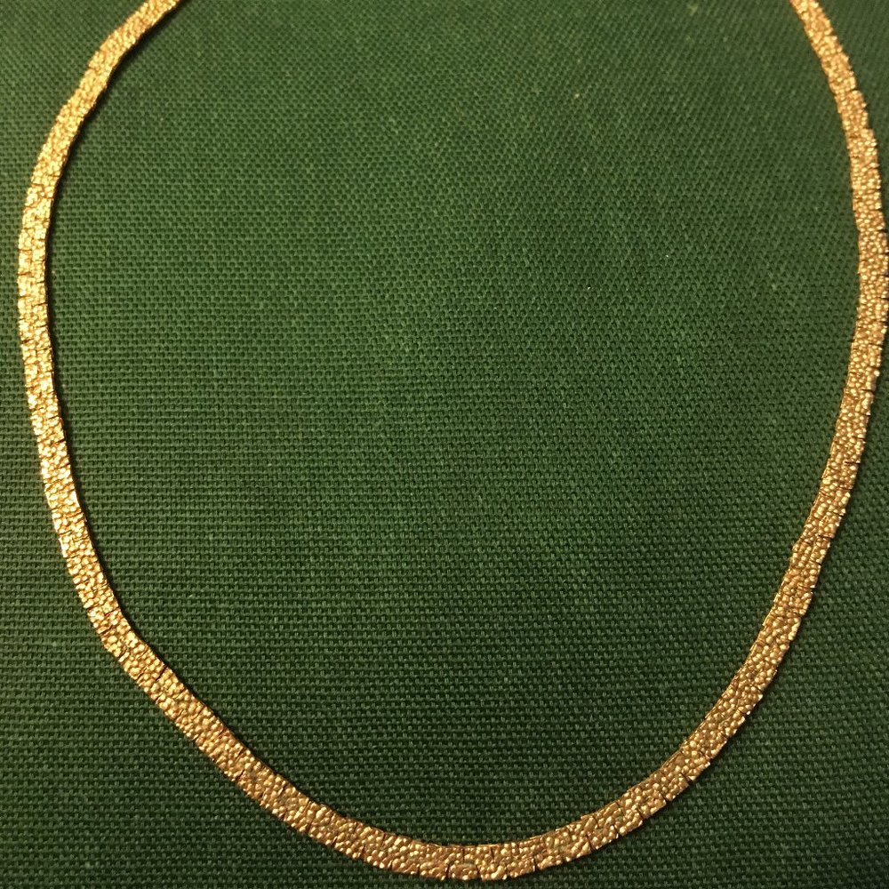 Dainty Gold tone chain flat nugget pattern